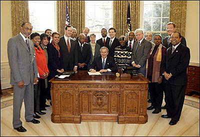 President George W. Bush signs H.R. 3491
