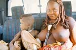 Himba woman and child on a drive in my car 